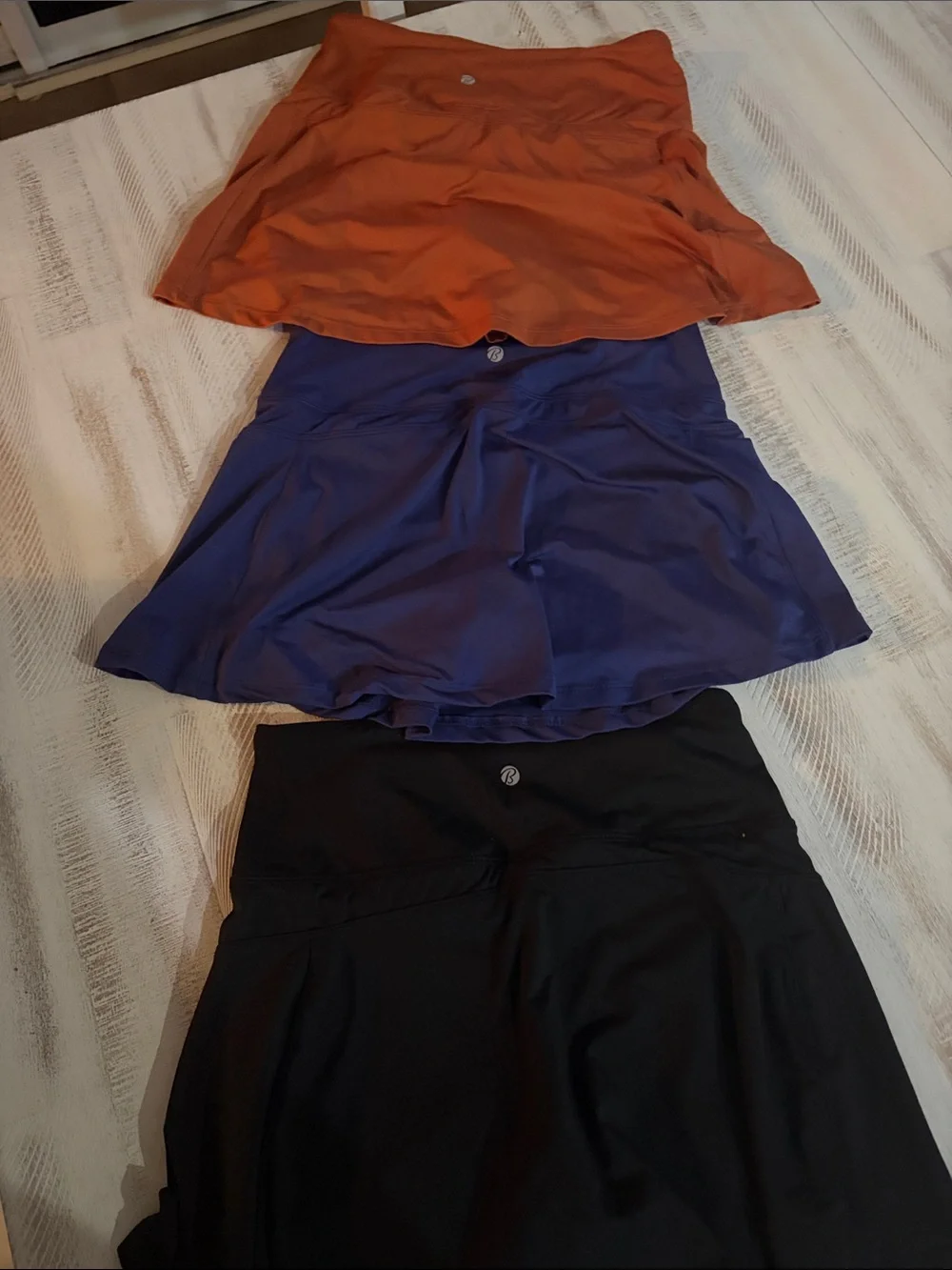 Bally Total Fitness Athletic Skorts in Rust, Blue, and Black